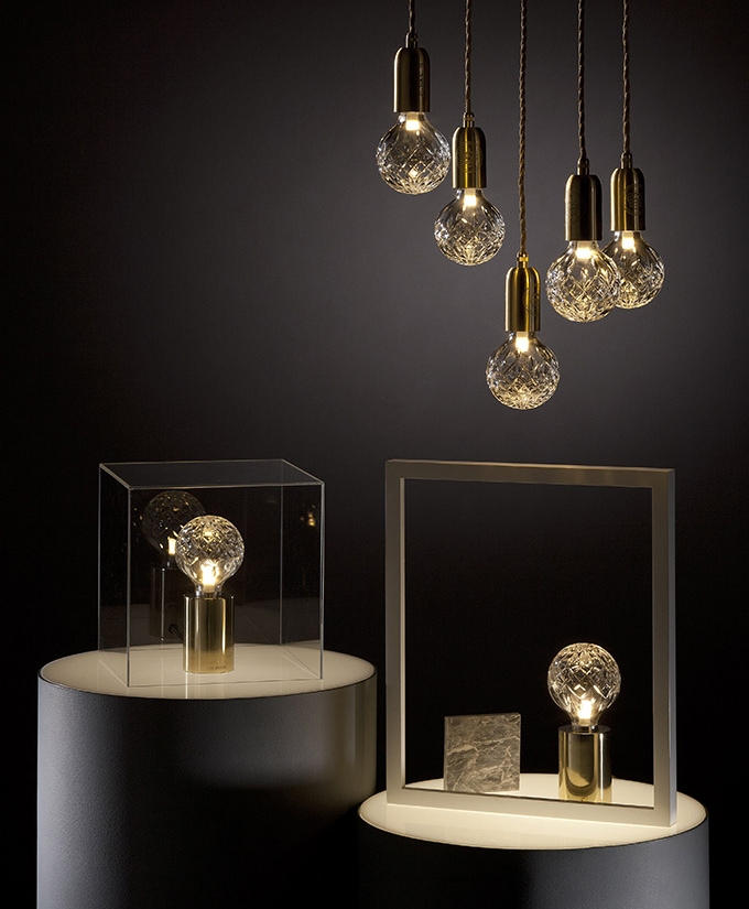 croppedimage680825-Clear-Crystal-Bulb-Chandelier-5-Piece-Brushed-Brass-Pendants-and-Polished-Gold-Table-Lamps-Lifestyle
